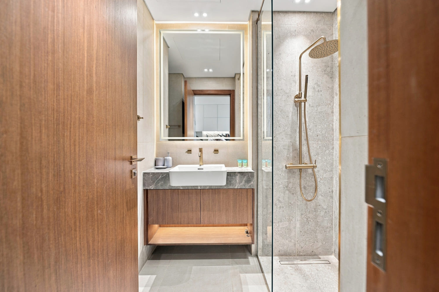 High-end studio layout with seamless spatial flow towards private balcony at Trillionaire Residences By Binghatti
