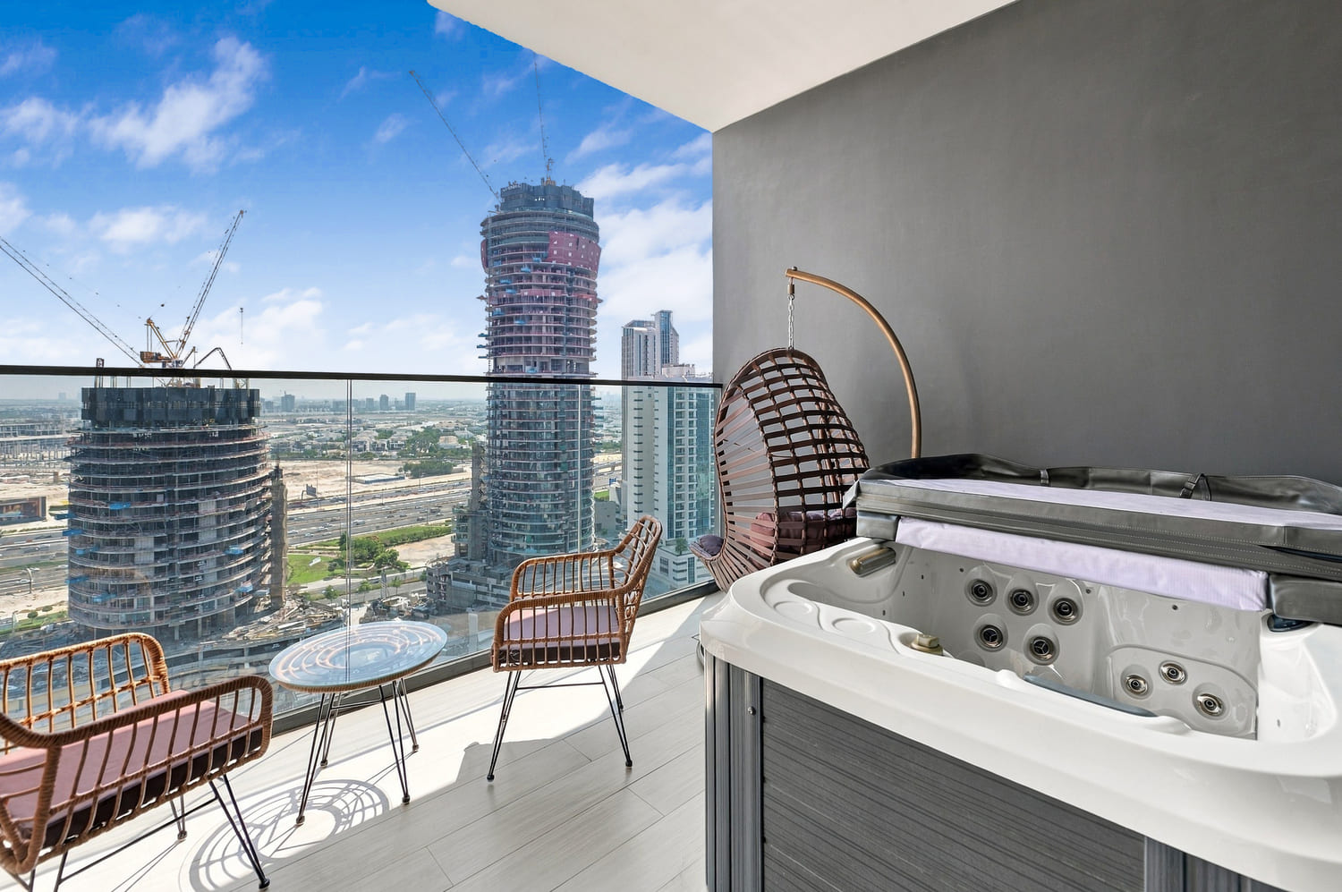 Clear glass balcony balustrade offering uninterrupted skyline sightlines from Trillionaire Residences