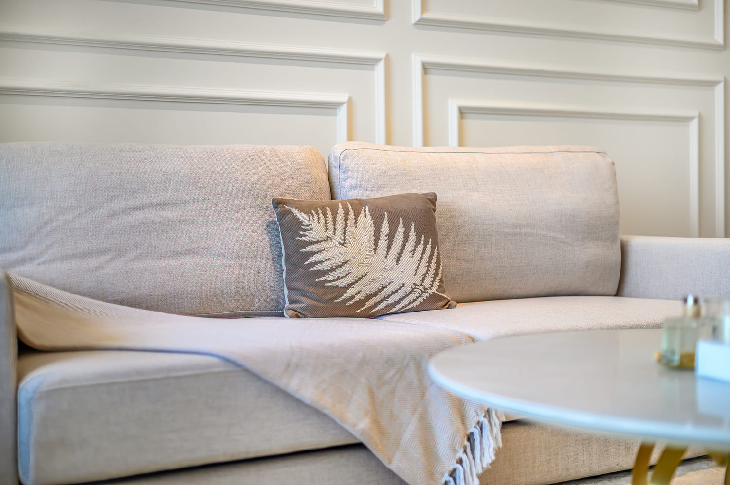 Custom wardrobe storage, wooden hangers, and luxury guest closet orientation staging