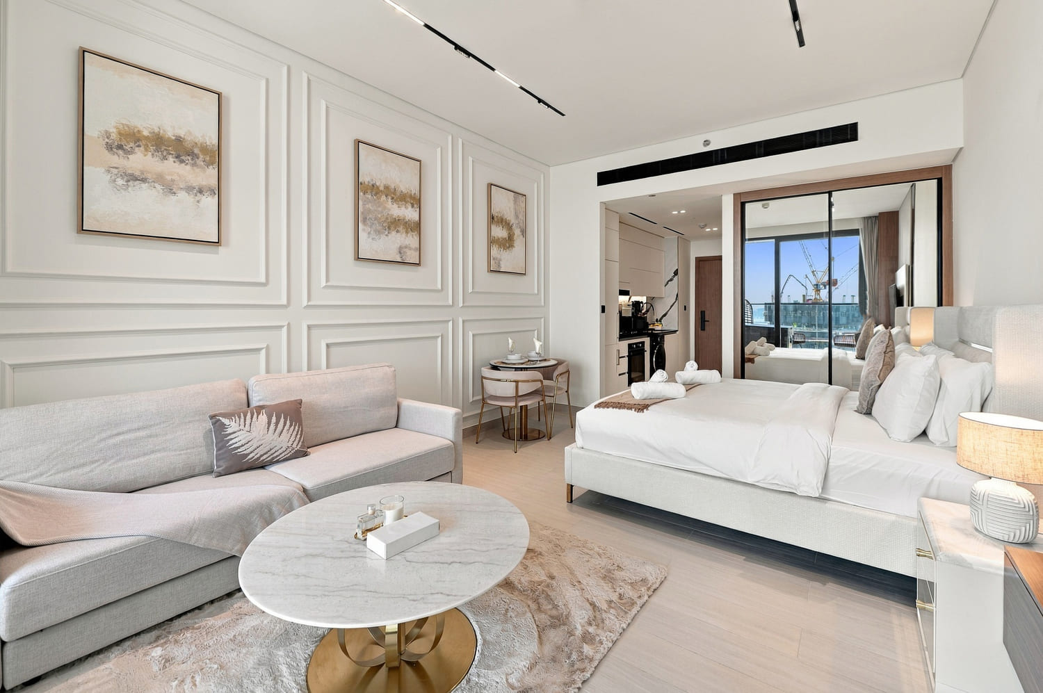 Sleek floor-to-ceiling custom wardrobes and entryway hall in Binghatti Trillionaire Residences