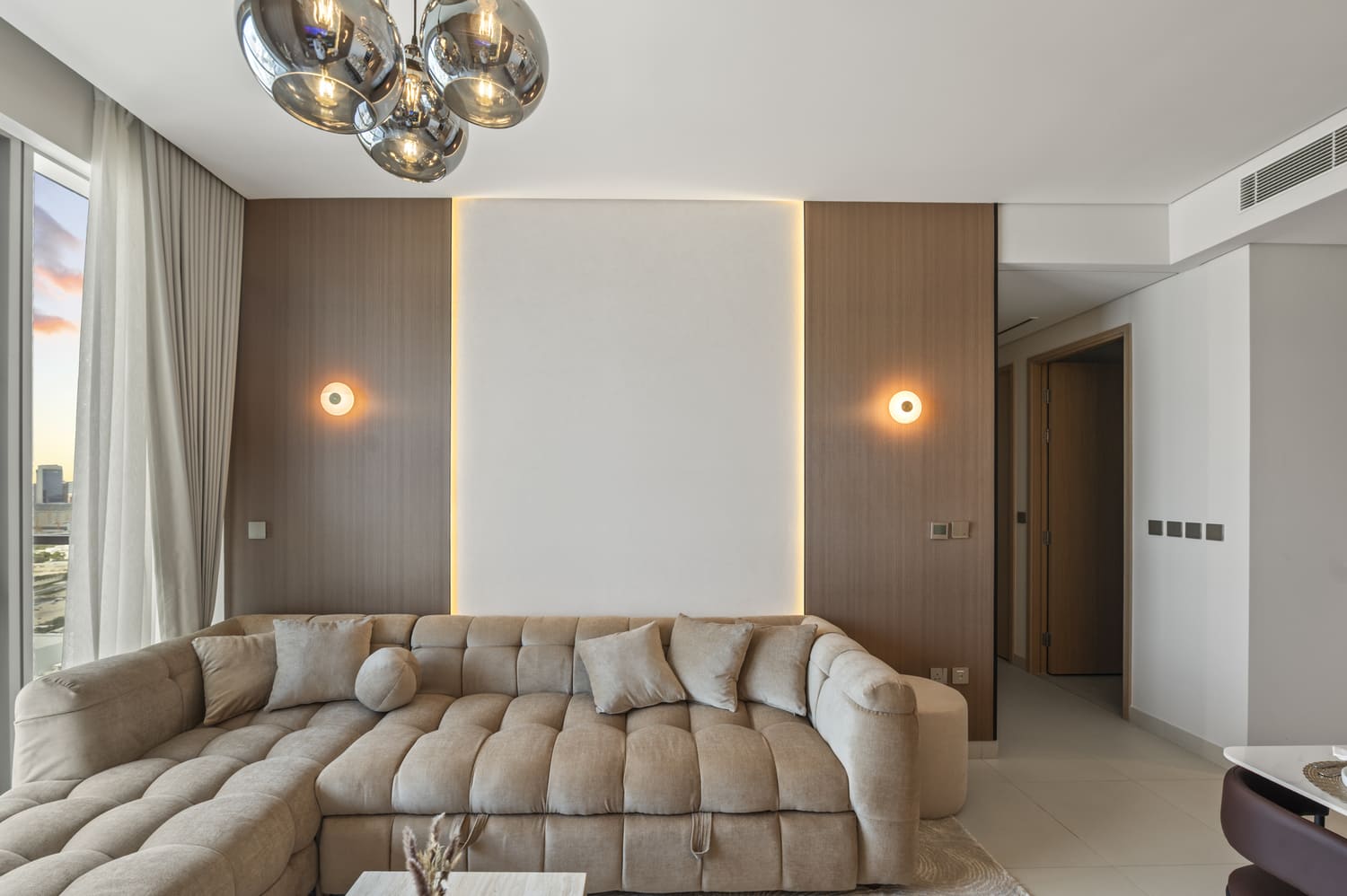 Contemporary designer sofa and coffee table vignette in Vida Tower 2 Dubai Mall short-term rental