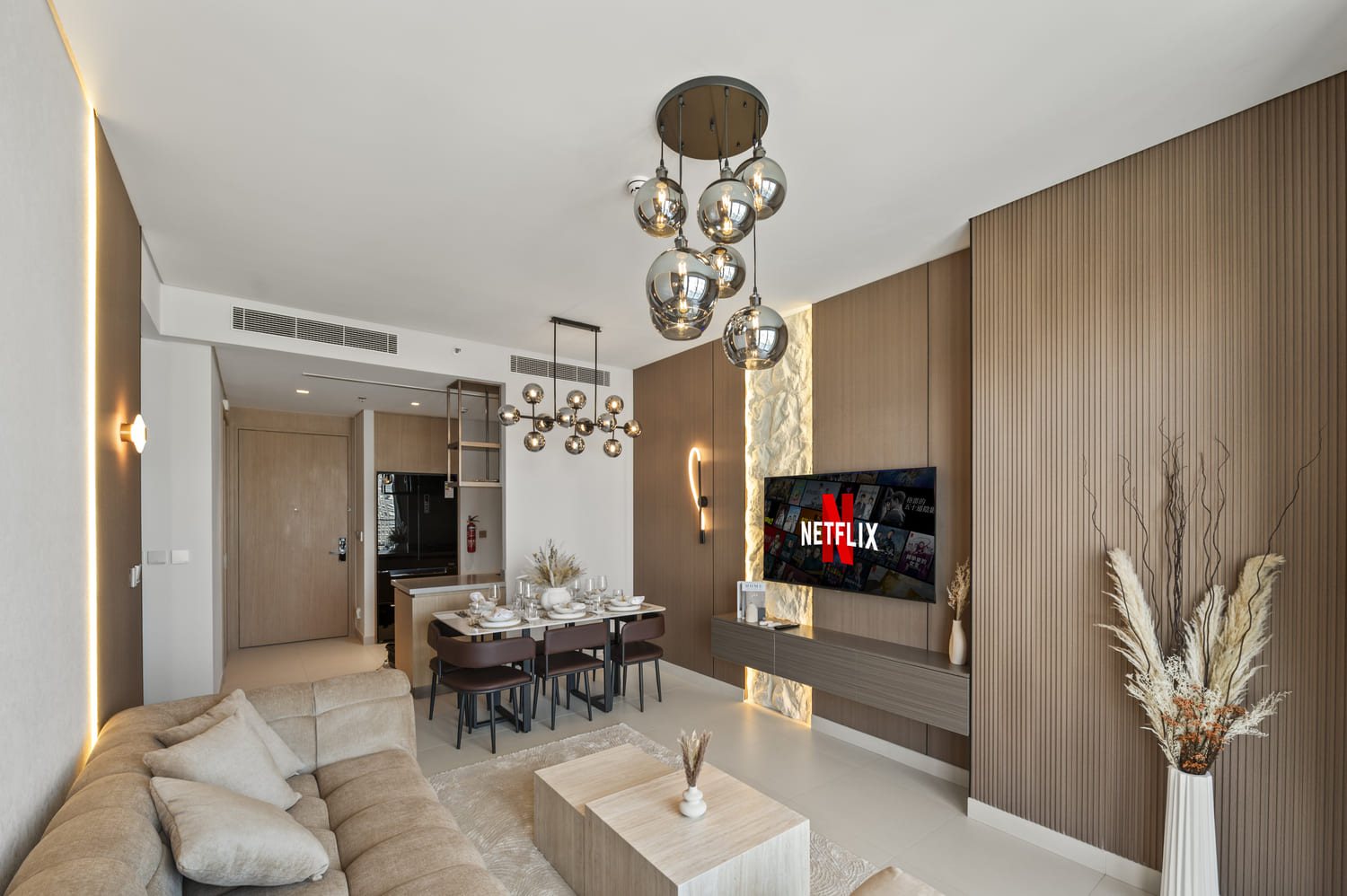 Wide-angle architectural perspective of living room and floor-to-ceiling drapery at Vida Tower 2 Dubai Mall