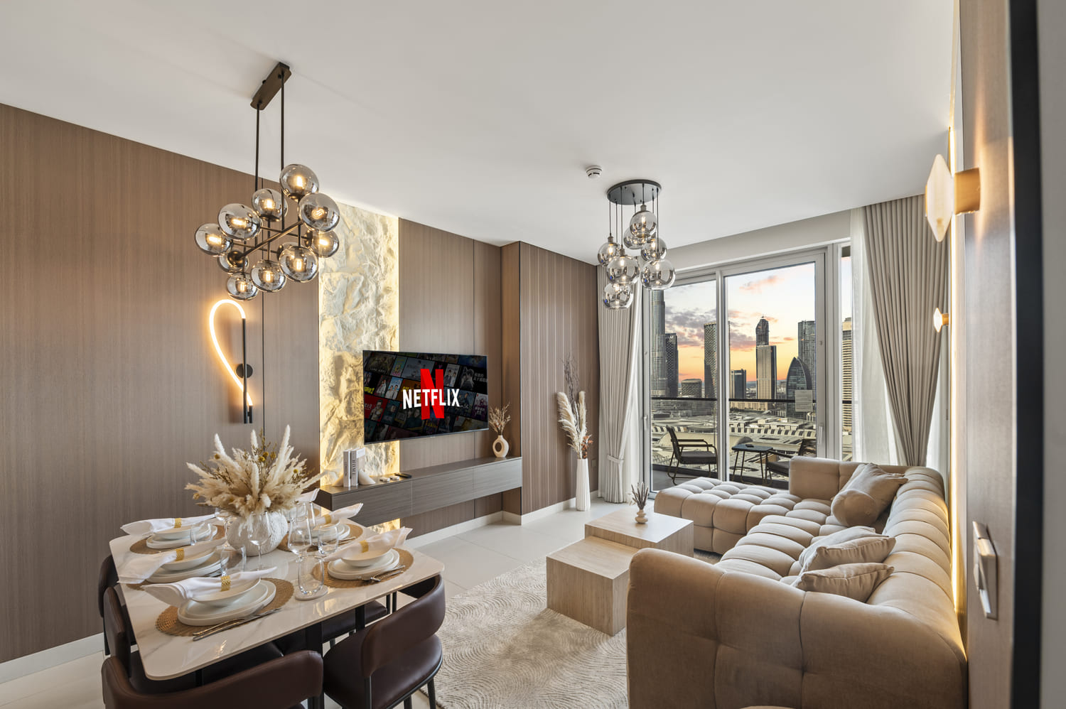 Balanced ambient lighting across the living and dining zone at Vida Tower 2 Dubai Mall holiday home