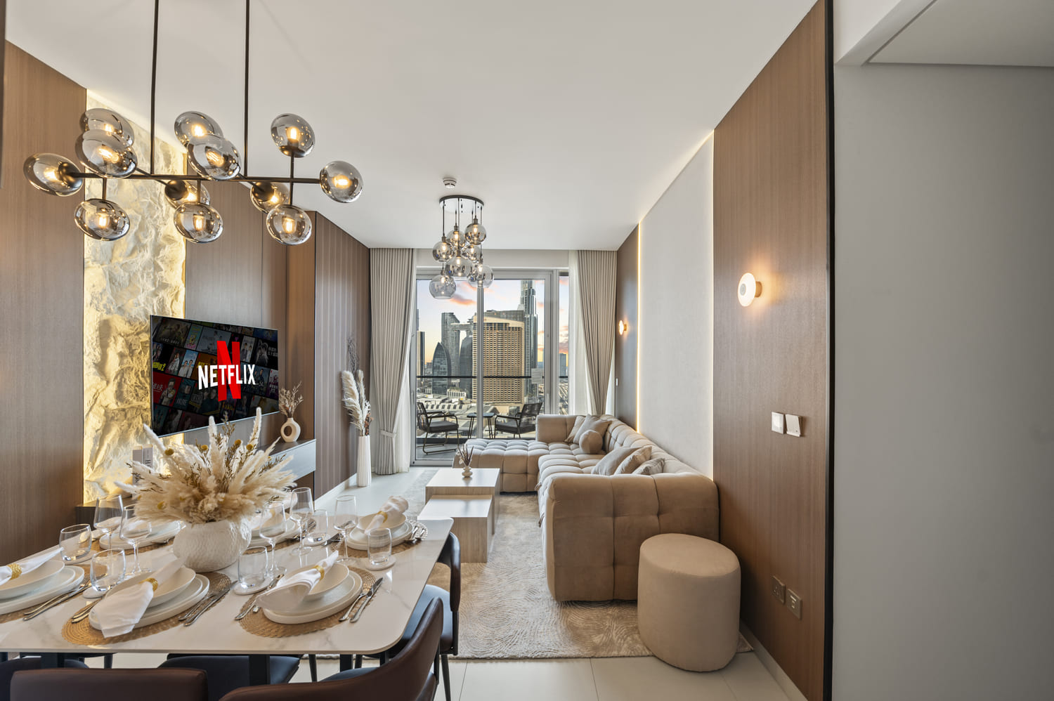Luxury apartment lounge seating and decorative wall art at Vida Tower 2 Downtown Dubai