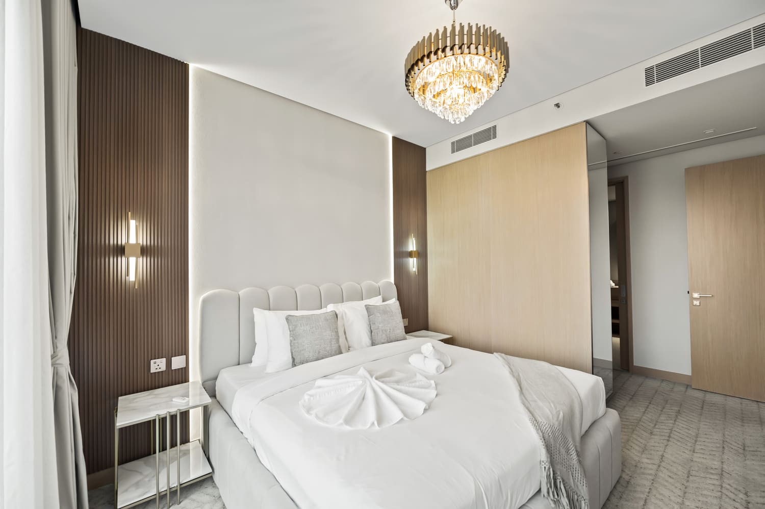 Living area perspective looking toward balcony glass doors at Vida Tower 2 Dubai Mall