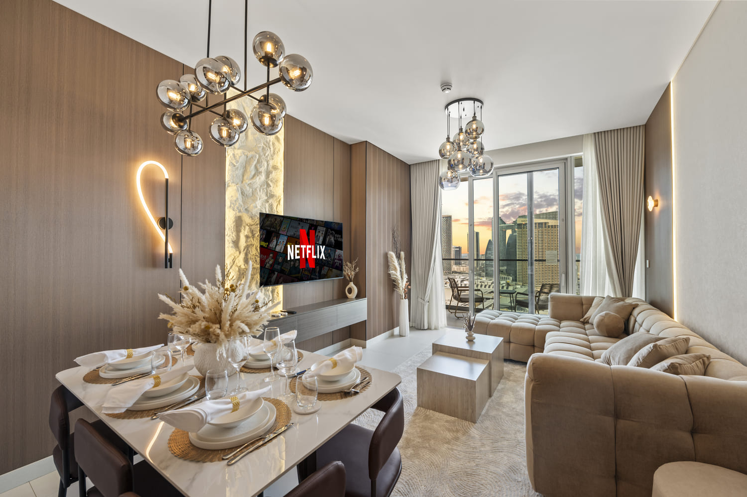 Luxury open-plan living and dining room interior at Vida Tower 2 Dubai Mall holiday home with natural daylight