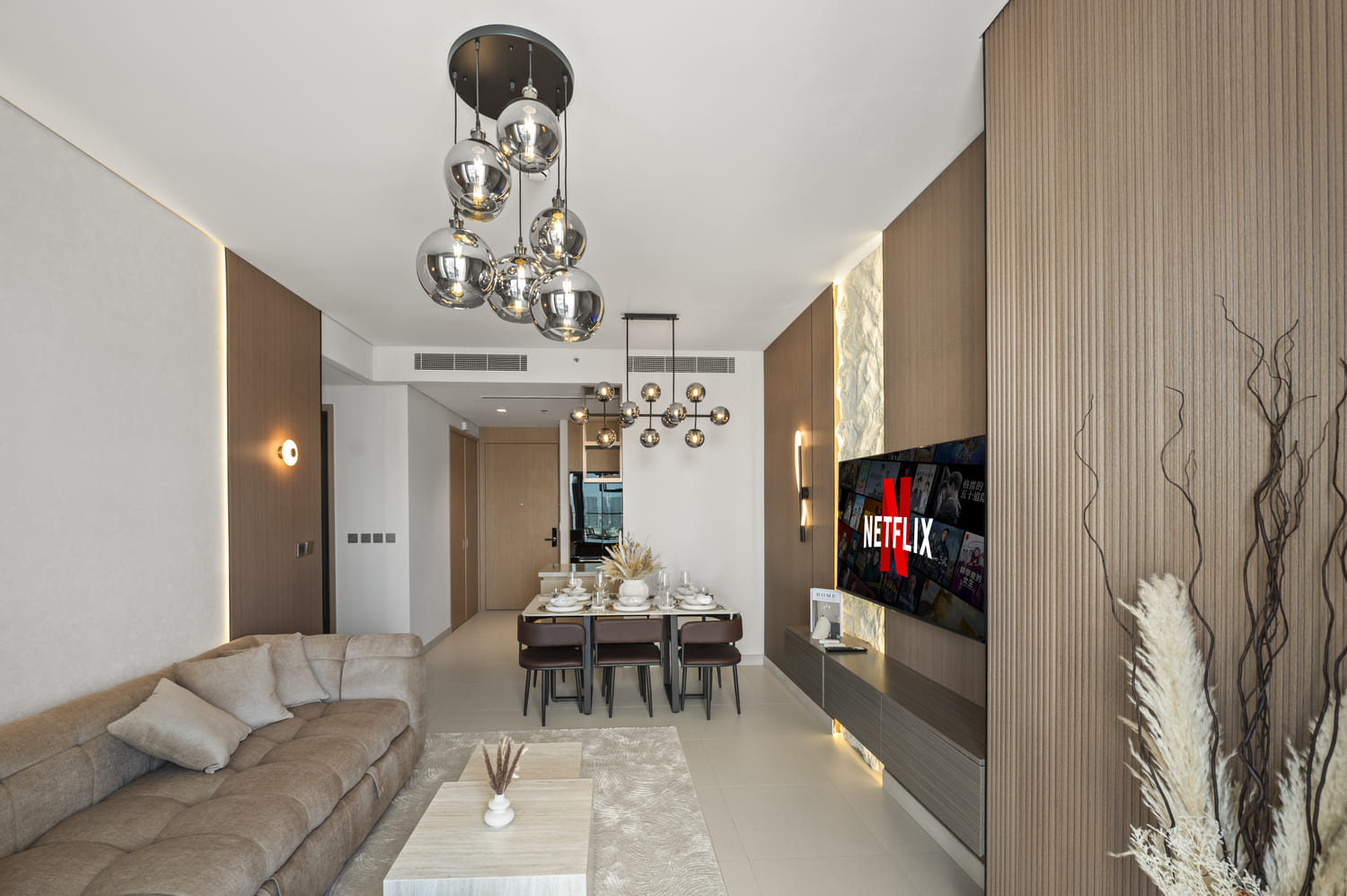 Spacious holiday home lounge and dining room staging at Vida Tower 2 Dubai Mall Downtown Dubai