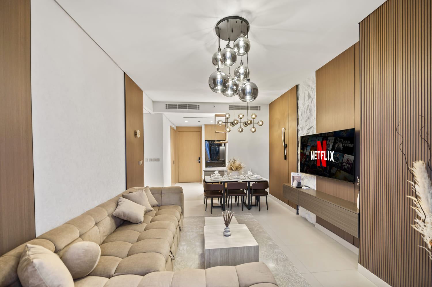 Bright modern dining hall and living space styled for Airbnb guests at Vida Tower 2 Downtown Dubai