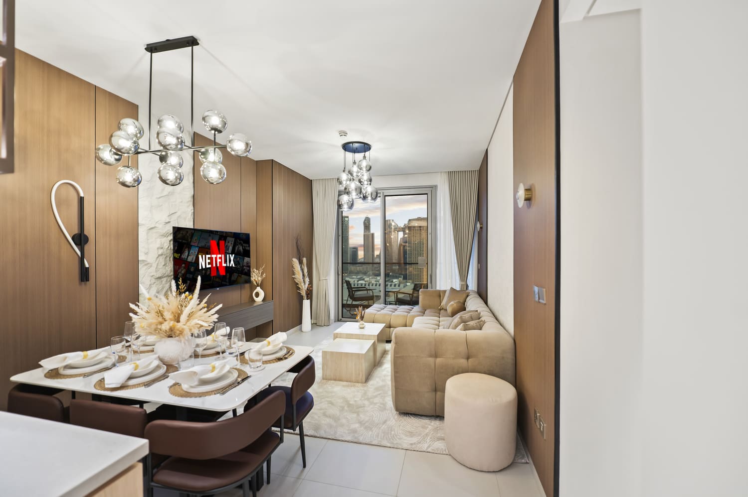 Full-width living and dining hall panorama showcasing spacious floor plan at Vida Tower 2 Dubai Mall