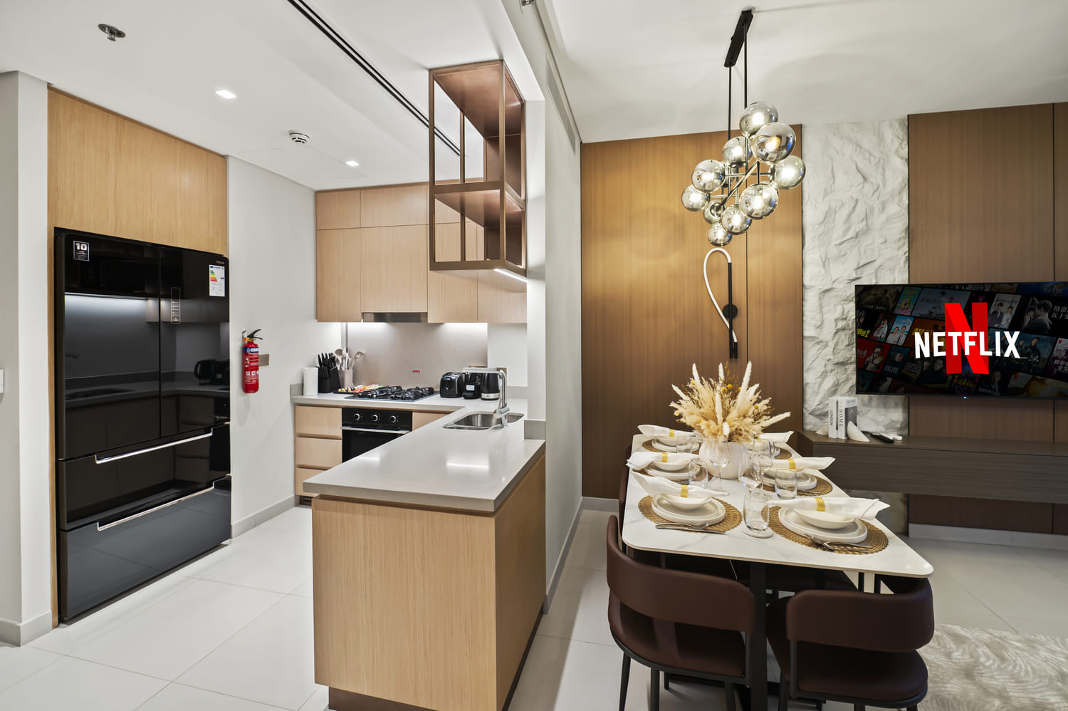 Detailed view of modern kitchen island and pendant lighting at Vida Tower 2 Dubai Mall