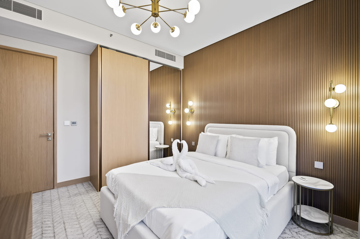 Bedroom interior perspective showcasing built-in storage and serene neutral palette at Vida Tower 2